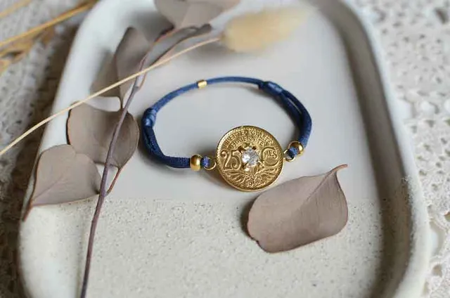 Le P’tit Franc Fraternité Étoilé 25 cts bracelet cordon zirconium