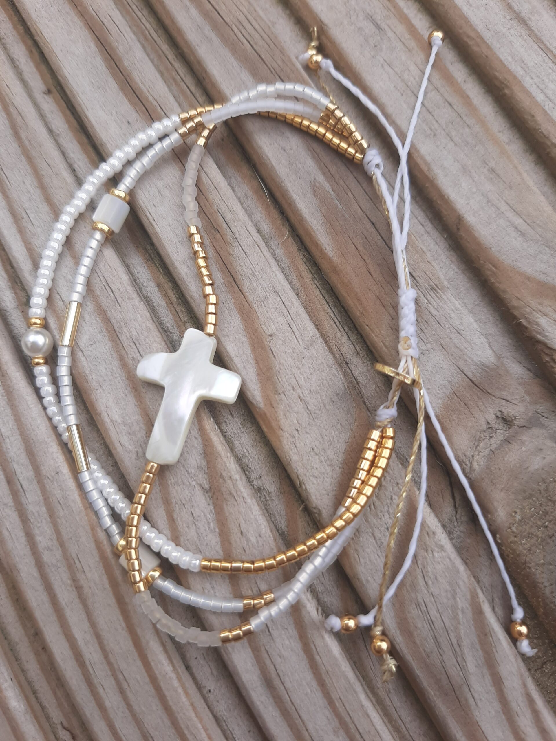 Les Ailes de Gloria P'tits Liens bracelet croix doré
