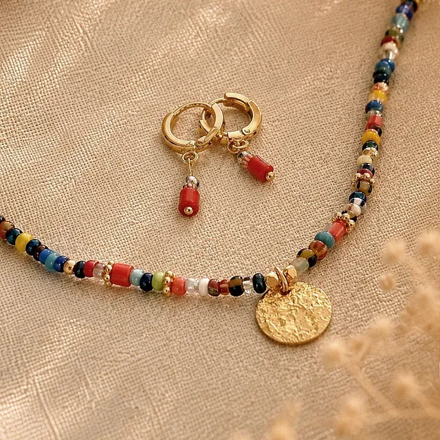 Ô PLUM LOMÉ collier médaille plaqué or perles Afrique