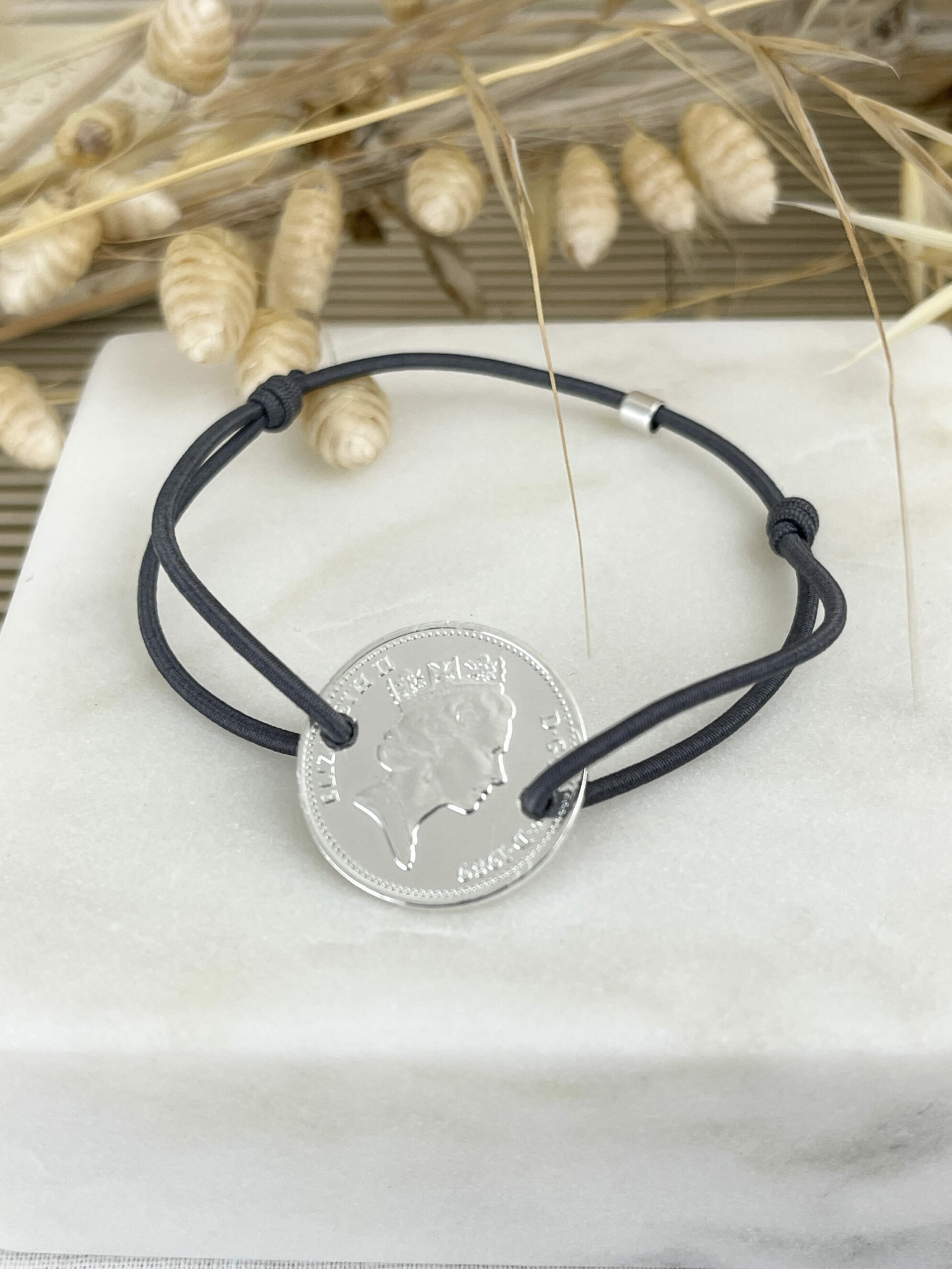 Le P’tit Franc One Penny bracelet pièce cordon élastique